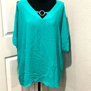 Blue women’s peek a boo sleeve blouse